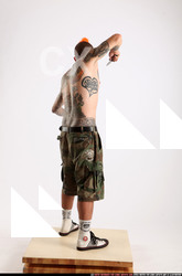 Man Adult Athletic White Fighting with knife Standing poses Pants