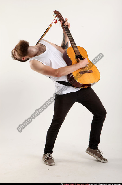 guitarist  Human poses reference, Pose reference photo, Figure poses