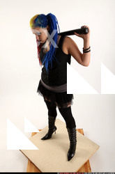 Woman Young Average White Standing poses Casual Fighting with bat
