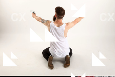 Man Adult Athletic White Fighting with gun Kneeling poses Casual
