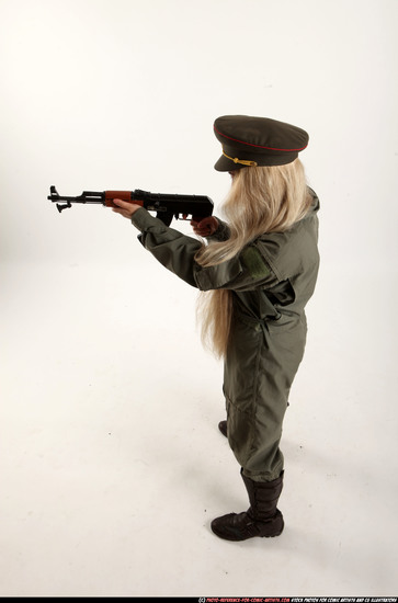 Woman Young Average Fighting with submachine gun Standing poses Army Asian