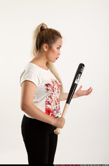 Woman Young Average Standing poses Casual Asian Fighting with bat