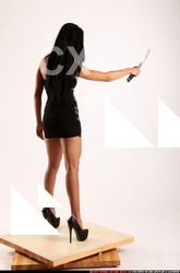 Woman Young Athletic Fighting with knife Standing poses Business Latino