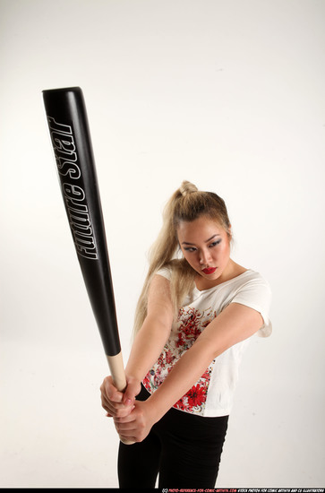 Woman Young Average Standing poses Casual Asian Fighting with bat