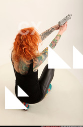 2016 05 ZORA KNEELING AIMING UZI 05 A