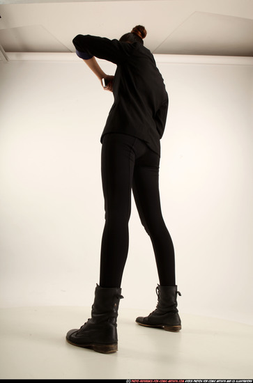 Woman Young Athletic White Fighting with gun Standing poses Business