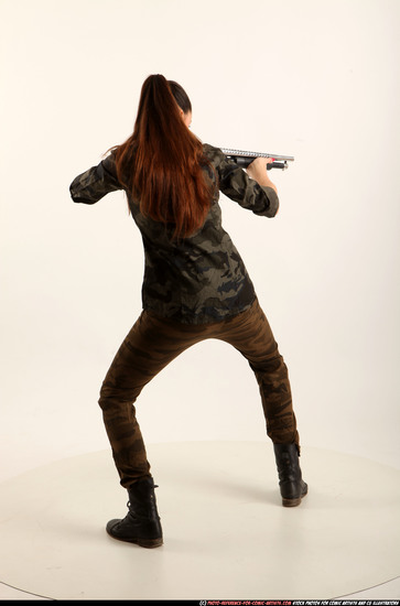 Woman Young Athletic White Standing poses Army Fighting with shotgun