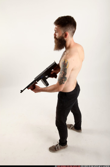 Man Adult Athletic White Fighting with submachine gun Standing poses Pants