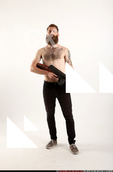 2016 08 OSCAR STANDING TOMMYGUN GUARDING 00 B