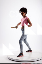 Woman Adult Athletic Black Fighting with sword Standing poses Casual