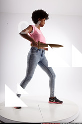 Woman Adult Athletic Black Fighting with sword Standing poses Casual