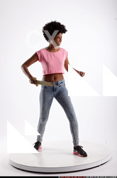 Woman Adult Athletic Black Fighting with sword Standing poses Casual