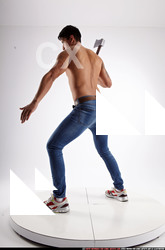 Man Young Athletic Fighting with sword Standing poses Pants Latino