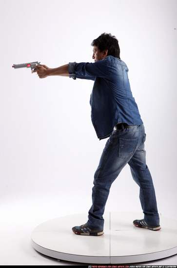 Man Adult Athletic Fighting with gun Standing poses Casual Asian
