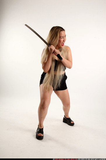 Woman Young Average Fighting with sword Standing poses Casual Asian