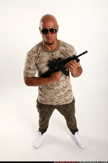Man Adult Athletic Black Fighting with submachine gun Standing poses Army