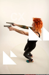 Woman Adult Athletic White Fighting with gun Standing poses Casual