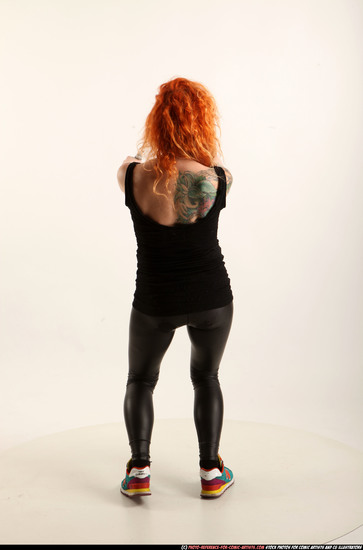 Woman Adult Athletic White Fighting with gun Standing poses Casual