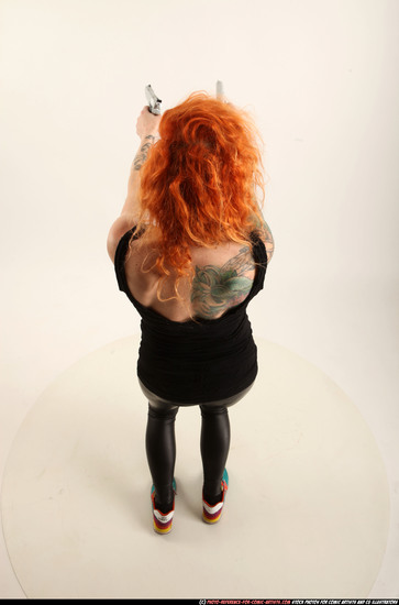 Woman Adult Athletic White Fighting with gun Standing poses Casual