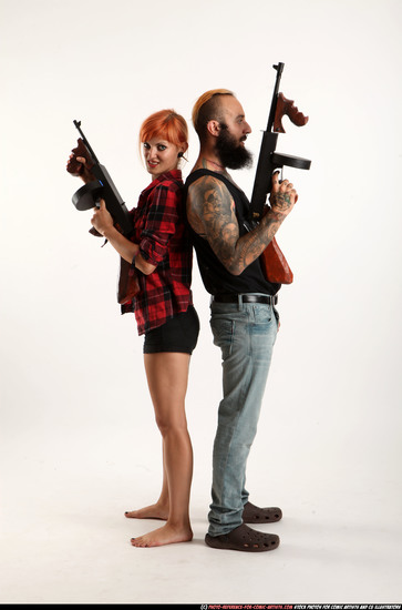 Man & Woman Adult Athletic White Fighting with submachine gun Standing poses Casual