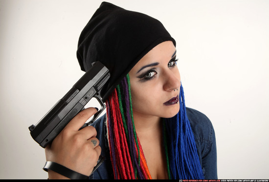 Woman Young Average White Fighting with gun Sitting poses Casual