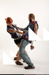 2017 02 COUPLE5 PISTOLS POSE2 SHOOTING 01