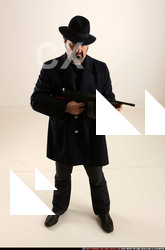 Man Old Average White Fighting with gun Standing poses Coat