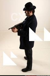 Man Old Average White Fighting with gun Standing poses Coat