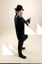 Man Old Average White Fighting with gun Standing poses Coat