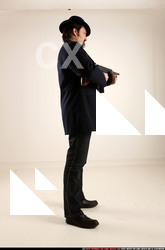 Man Old Average White Fighting with gun Standing poses Coat