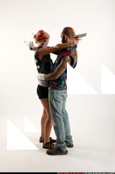 2017 04 COUPLE5 PISTOLS POSE4 CROSS SHOOTING 01