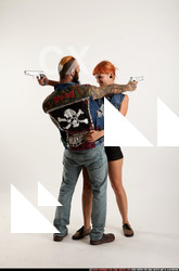 2017 04 COUPLE5 PISTOLS POSE4 CROSS SHOOTING 03