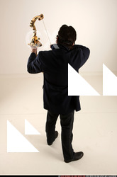 Man Old Average White Fighting with bow Standing poses Coat