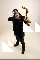 Man Old Average White Fighting with bow Standing poses Coat