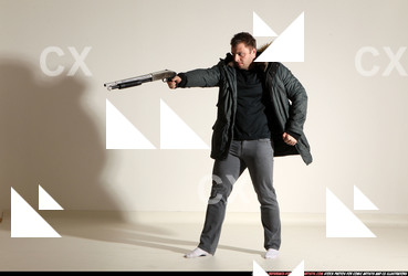 Man Adult Muscular White Fighting with gun Standing poses Casual