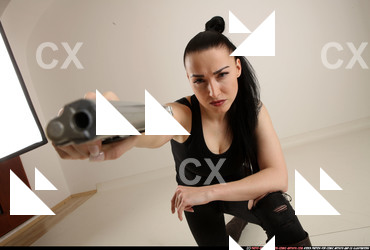 2017 05 CLAUDIA KNEELING AIMING PISTOL 11