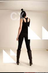 2017 05 CLAUDIA STANDING AIMING PISTOL 04 C