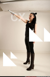 Woman Adult Athletic White Fighting with gun Standing poses Casual