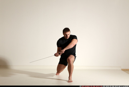 Man Adult Muscular White Fighting with sword Kneeling poses Sportswear