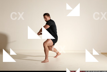 Man Adult Muscular White Fighting with sword Kneeling poses Sportswear