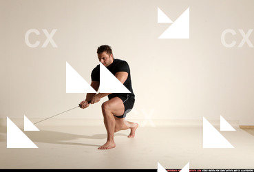 Man Adult Muscular White Fighting with sword Kneeling poses Sportswear