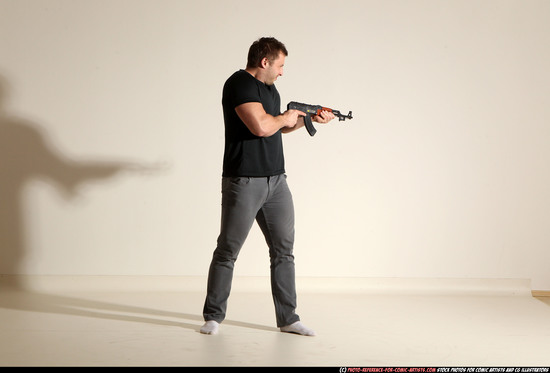 Man Adult Muscular White Fighting with submachine gun Moving poses Casual