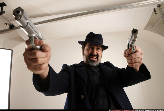 Man Old Average White Fighting with gun Standing poses Coat