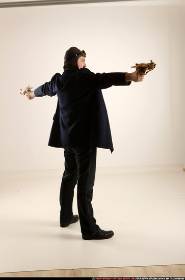 Man Old Average White Fighting with gun Standing poses Coat