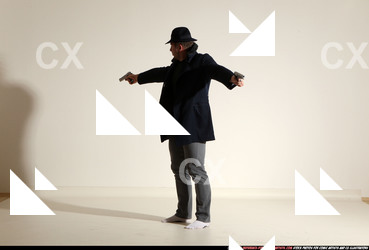 Man Adult Muscular White Fighting with gun Standing poses Coat