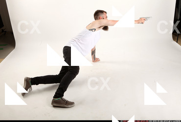 Man Adult Athletic White Fighting with gun Laying poses Casual
