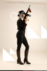 Woman Adult Athletic White Fighting with submachine gun Standing poses Casual