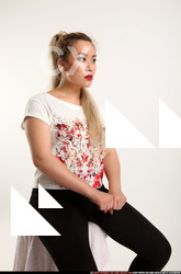 Woman Young Average Neutral Casual Asian