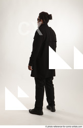 Man Adult Average Black Fighting with gun Standing poses Coat