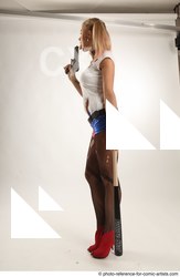 Woman Adult Average White Fighting without gun Standing poses Coat